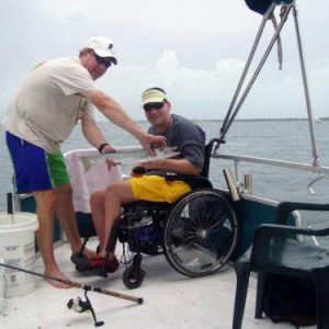 special-to-the-times-capt-mick-nealey-enjoying-a-day-of-fishing-with-one-of-his-physically-challenged-customers